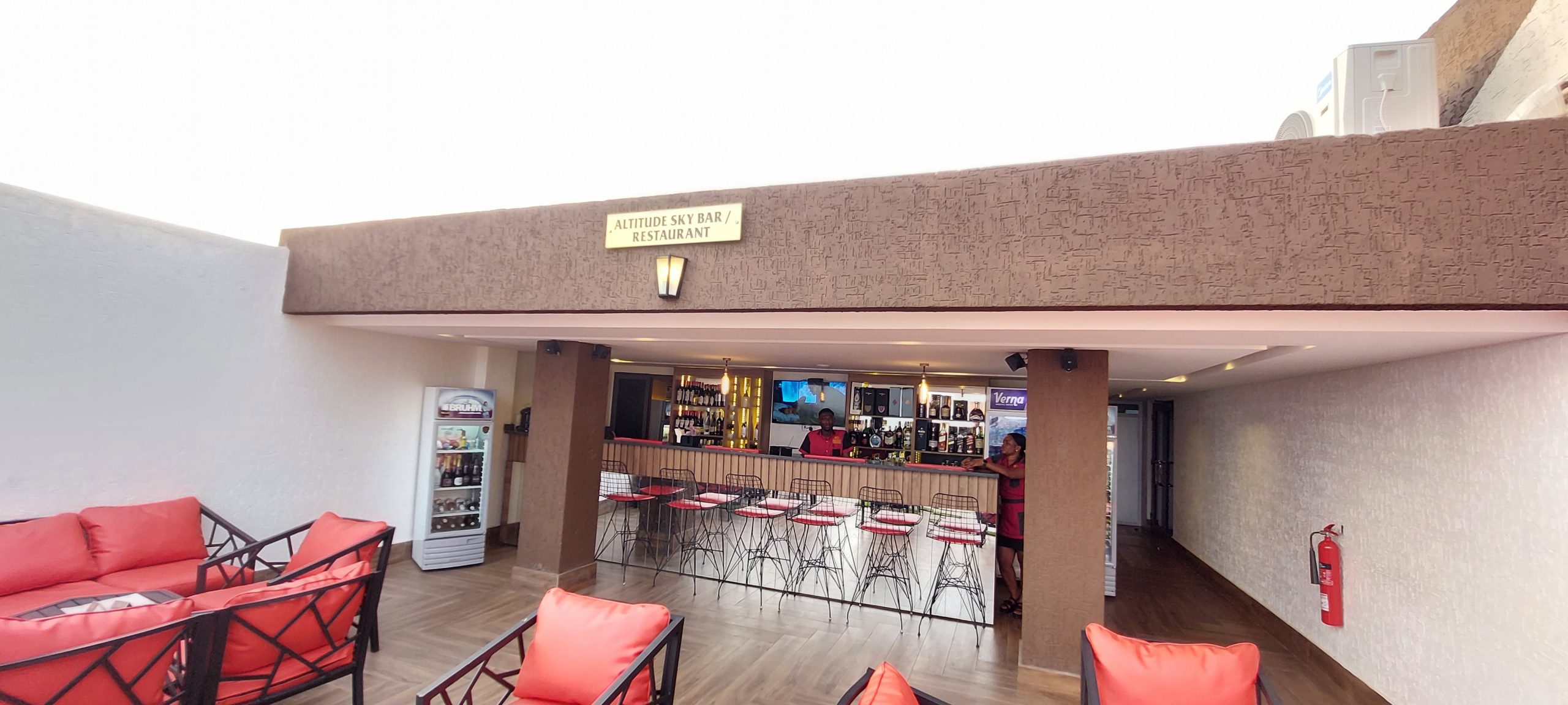 Lounge seating at Altitude Sky Bar, Ridge Condos Kumasi, used for evening receptions