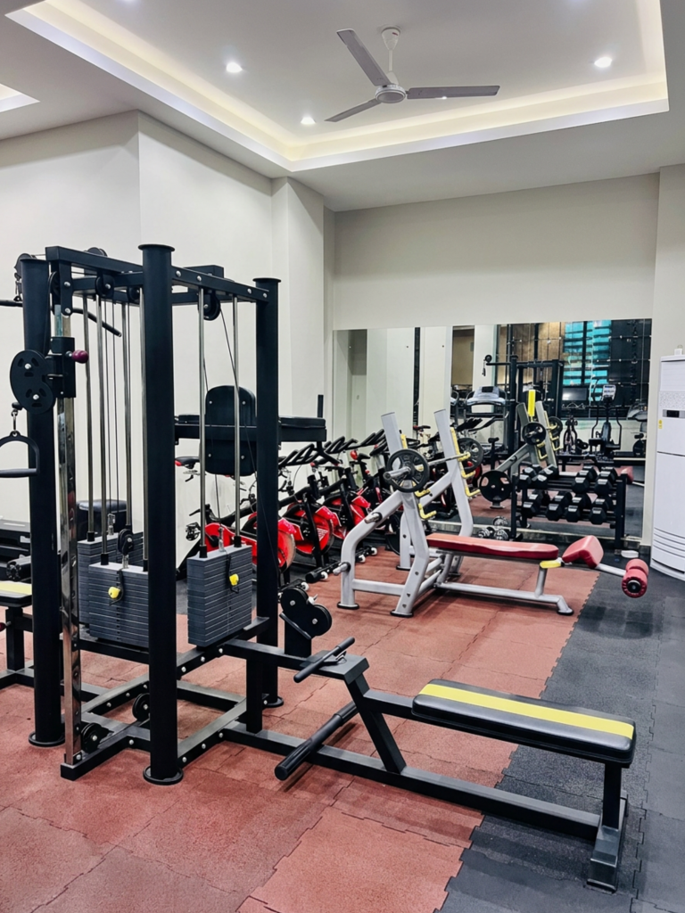 Fitness gym with cardio and weight equipment at Ridge Condos, Kumasi