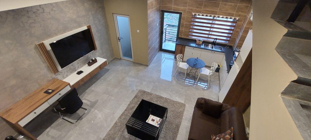 Two-level duplex apartment interior at Ridge Condos, Kumasi