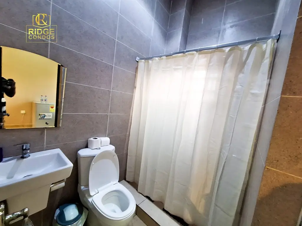 Standard room interior at Ridge Condos, Kumasi